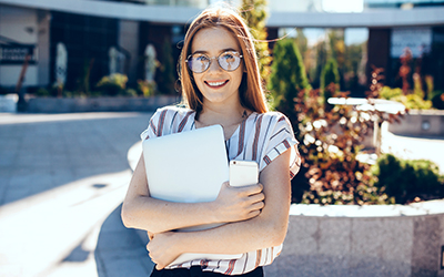 A woman outside a workplace 