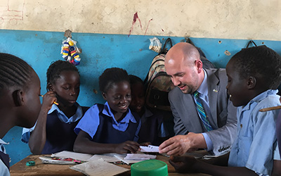 Ben Macpherson, while Scottish Government Minister, visiting a Zambian school class as part of the ZEST programme