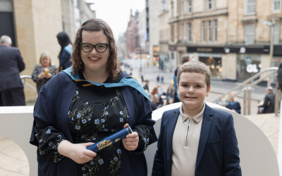 OU graduate Vicki and her son, pictured on the day of her degree ceremony. Photo by Kathryn Tuckerman. 