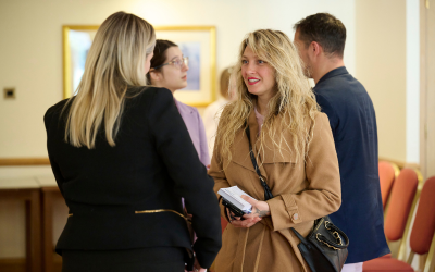 Two people in discussion at the Skills for Business Roadshow in Inverness - Photo by Ewen Weatherspoon
