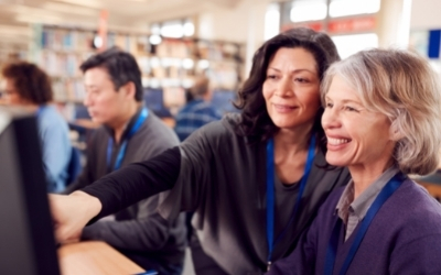 People at a computer in a community library