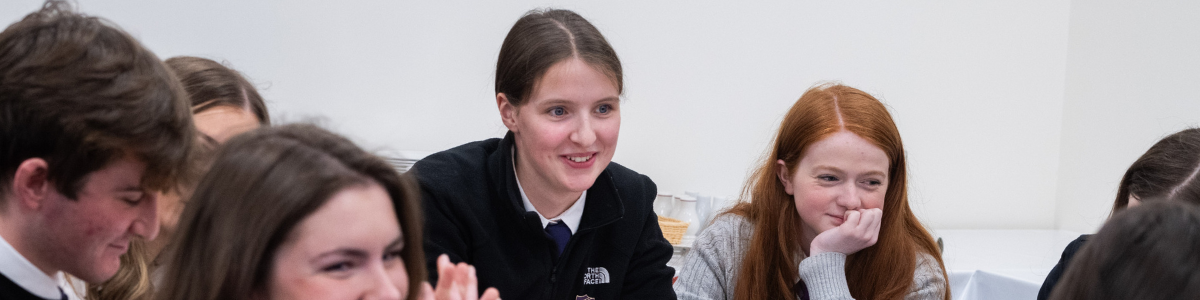 High school students engaging in a discussion