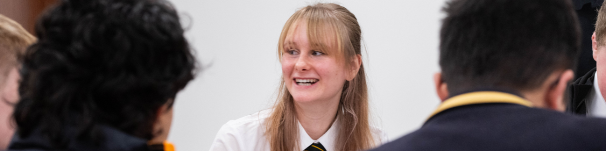 a high school student smiling