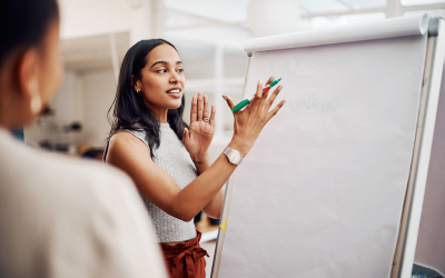 A women using a flipchart to teach