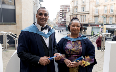 OU graduates Elvis and Arlene