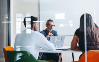 Three people in business meeting