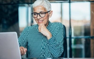 Photo of a woman with a laptop