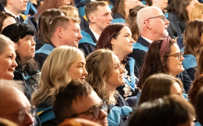 Graduates at an Open University ceremony held in Glasgow.