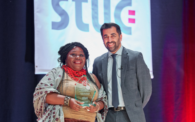 Scottish First Minister Humza Yousaf with the Scottish Union Learning Learner of the Year Award Fadzai Mwakutuya