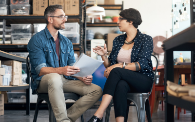People chatting in a workshop
