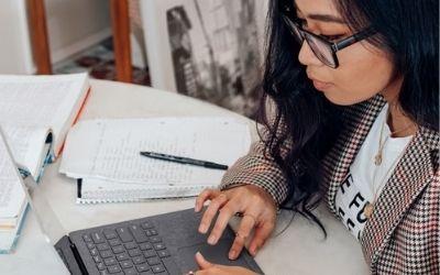 Woman with laptop. Photo by Surface. 