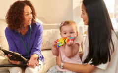 Official chatting to a parent