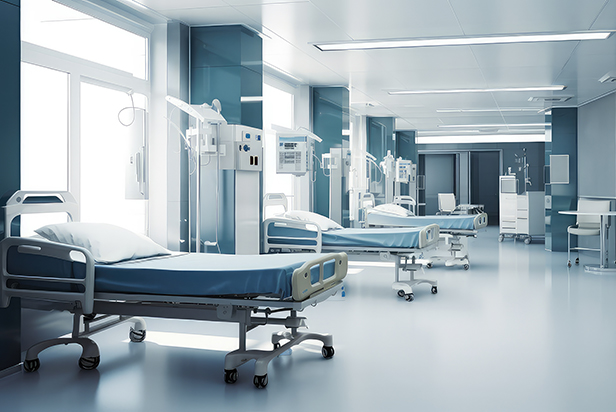 Empty hospital bed inside room
