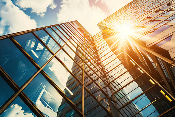 Modern corporate office building captured from a low angle during a vibrant sunset-symbolizing-business-success-growth-and-future-development