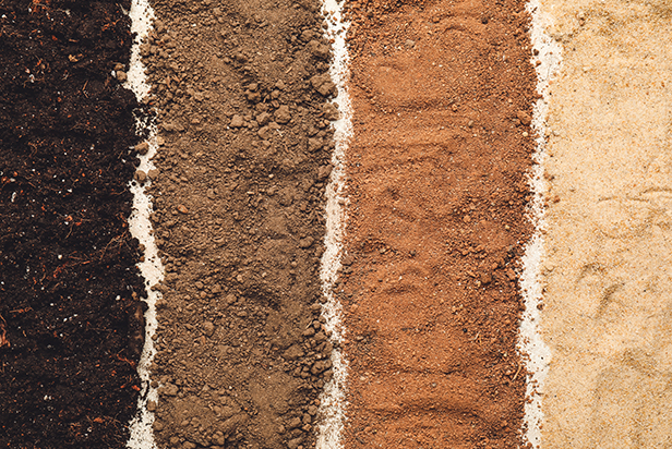 Different types of soil as background