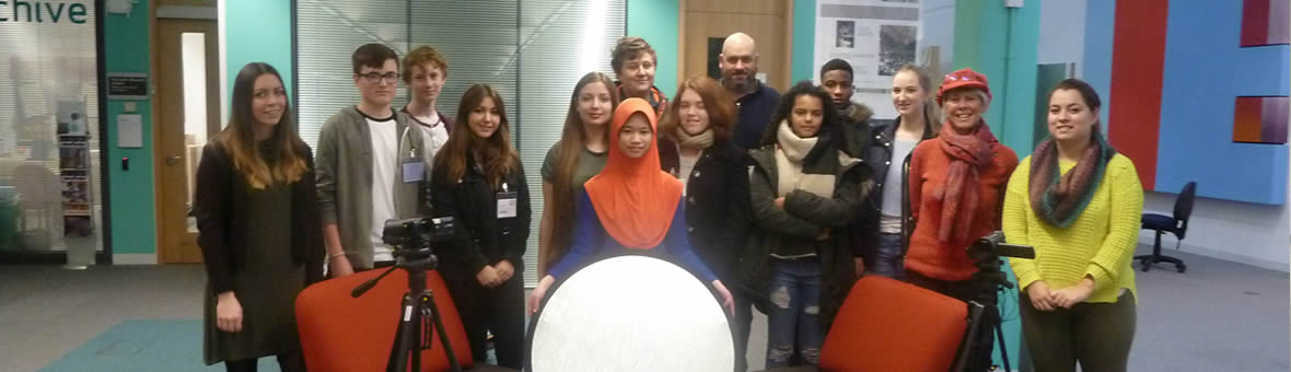 Educational Research - a group of young people and their instructors with cameras and other filming equipment