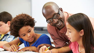 Teacher with pupils