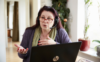 Tutor talking into headset