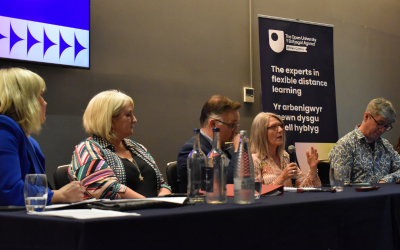 Panel of speakers having a discussion at event