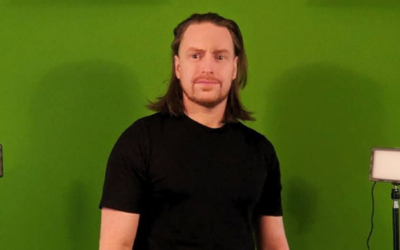 Person in front of a green screen